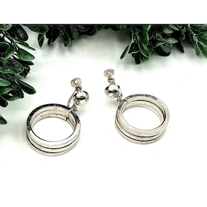Vintage Coro Silver-Tone Clip-On Hoop Earrings With Triple Circle Design