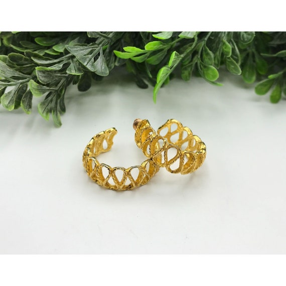 Gold tone textured cut out hooped earrings - image 1