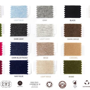 May include: A collection of eighteen rectangular fabric swatches with pinked edges, arranged in a grid. Colors include white, light blue, gray, black, creamy, green, dark gray, light gray, dark beige, pink, dark blue, beige, caramel, wine red, navy blue, light beige, and khaki.