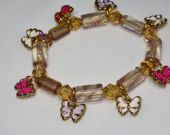 Charm Braclet. Butterflys. Furnace Art Glass Beads with Swarovski Crystal Beads. One of a Kind, hand made by  Designer DavidNeil.