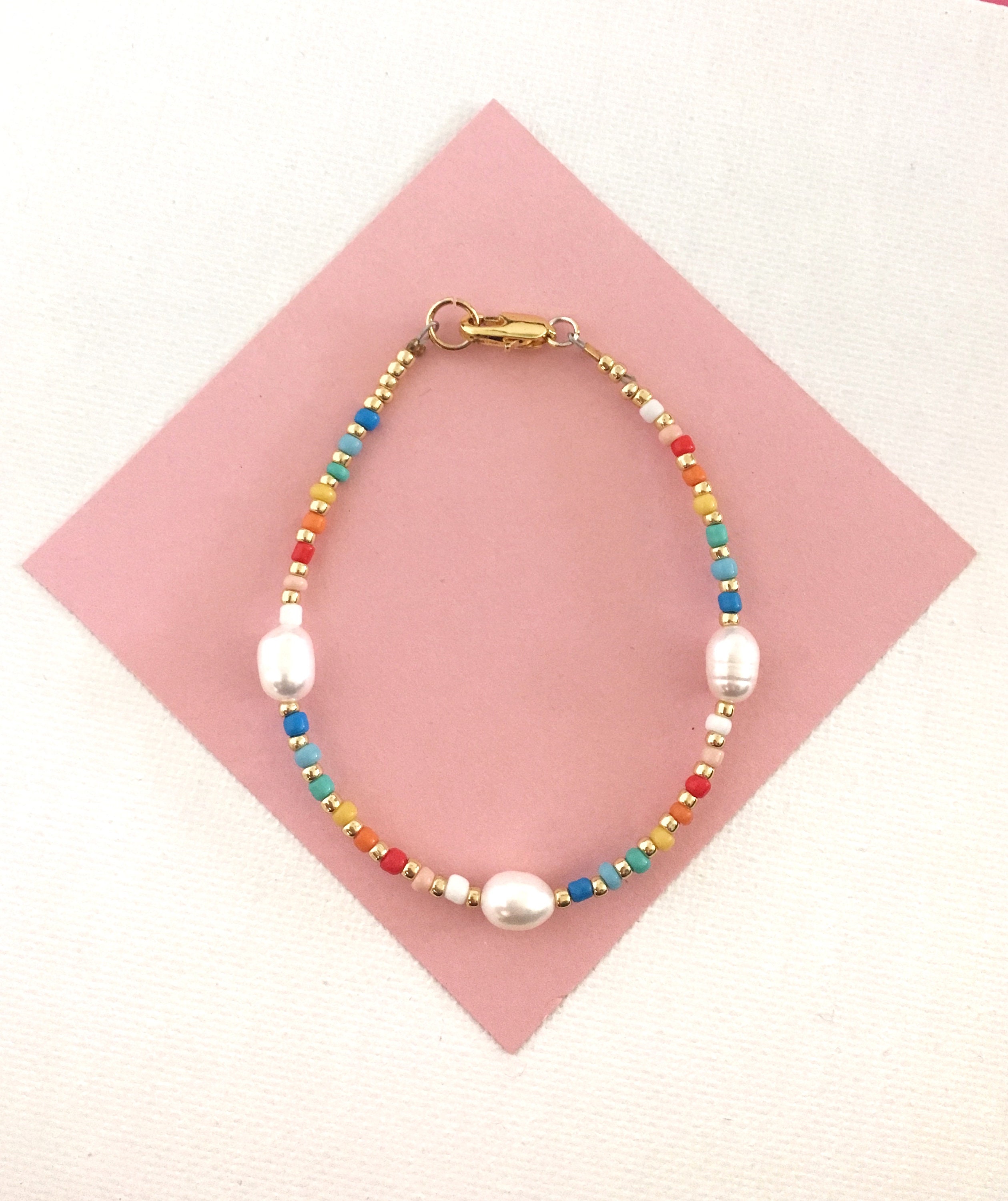 Rainbow Pearl Elastic Bracelet Project with Charm Bracelet – Beadniks  Chicago