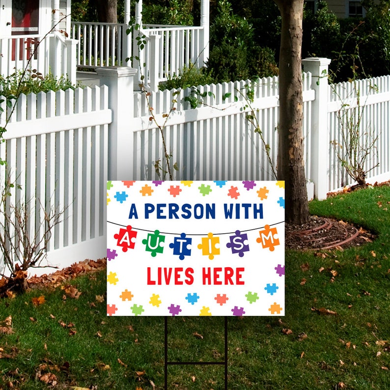 A Person with Autism Lives Here Yard Sign 18 x 12 Coroplast Visible Text Autism Awareness Puzzle Pieces Yard Sign with Metal H-Stake