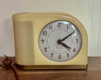 Vintage Westeclox alarm clock yellow Bakelite plastic