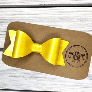 Yellow patent faux leather hair bow