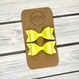 Neon yellow matter glitter pigtail hair bows