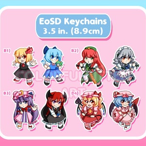 Könnte beinhalten: Ein Bogen mit farbenfrohen EoSD-Schlüsselanhänger-Aufklebern, die jeweils einen anderen Anime-Charakter zeigen. Die Aufkleber sind etwa 8,9 cm hoch und haben einen rosa und blauen Rand. Der Text "EoSD Keychains" steht oben.