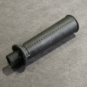 May include: Black plastic handle with a textured surface and a small round opening at one end.