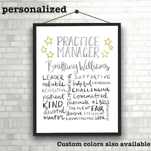 May include: A black framed print with a white background and gold stars. The text "Practice Manager" is written in black with the name "Brittany Williams" written below it. The print features a word cloud of positive attributes, such as "leader", "reliable", "supportive", "helpful", "patient", "committed", "kind", "devoted", "mentor", "passionate", "challenging", "decisive", "efficient", "fair", "knowledgeable", and "loyal". The text "Custom colors also available" is written at the bottom of the print.
