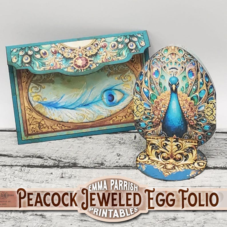 May include: A printable peacock jeweled egg folio featuring a blue and green peacock design. The folio is a 3D paper craft project that can be used to store small items or as a decorative piece.