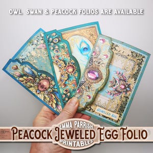 May include: A set of three printable folios featuring a peacock, owl, and swan design. Each folio has a jeweled egg design with gold accents and a blue and green colour scheme. The text "JEWELED EGG" is visible on one of the folios. The text "PEACOCK JEWELED EGG FOLIO PRINTABLES" is visible at the bottom of the image.
