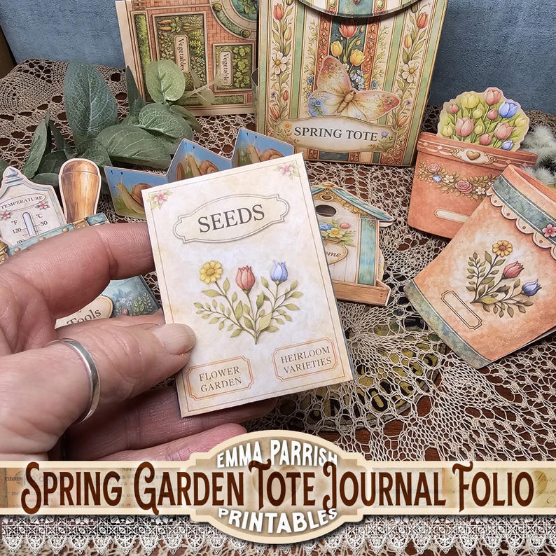 May include: A collection of spring-themed paper crafts, including a seed packet with floral illustrations, a birdhouse, and a tote bag. The seed packet reads "SEEDS" and "Flower Garden" with the text "Heirloom Varieties". The words "Spring Garden Tote Journal Folio Printables" are also visible.