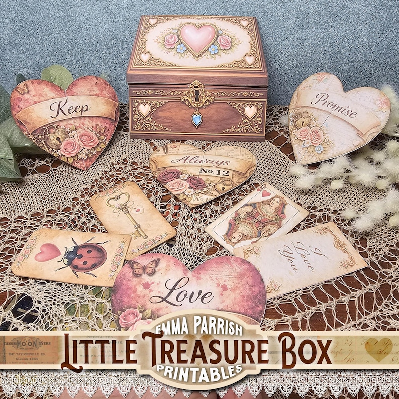 May include: A wooden treasure box with a heart-shaped design and a lock, surrounded by heart-shaped cards and decorative cards. The cards feature floral and vintage designs with phrases like "Keep" and "Love". The image includes the text "Little Treasure Box Printables".