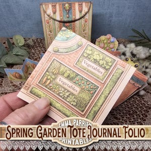 May include: A Spring Garden Tote Journal Folio printable with a garden scene. The journal features illustrations of vegetable gardens with the word "Vegetables" on the labels. The background includes a decorative floral pattern and a matching envelope.