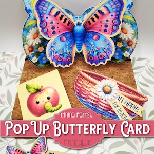 May include: Printable pop-up butterfly card featuring a colourful butterfly design. The card includes a thank you message and a cute apple illustration. The text on the card reads "Thank You for giving me wings" and "An apple for teacher".