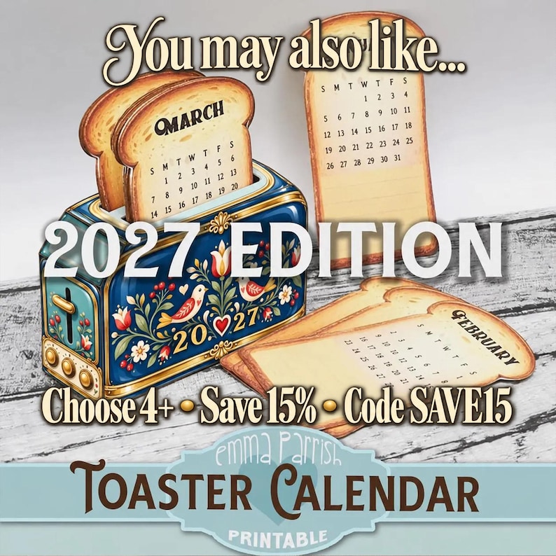 May include: A decorative blue toaster-shaped calendar for 2027 featuring folk-art style floral and bird illustrations. The toaster holds bread-shaped calendar pages for March, while February pages lie flat. Text includes "2027 EDITION" and "TOASTER CALENDAR".