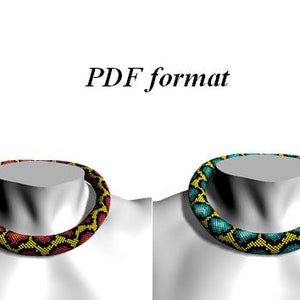 May include: Two beaded necklaces, one with red and yellow beads and the other with blue and yellow beads. Both necklaces are in the shape of a snake with a heart pattern.