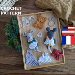 Pode incluir: Padrão de crochê para dois adoráveis ratinhos amigurumi. O padrão inclui uma variedade de roupas para os ratinhos, incluindo um vestido, um colete, um chapéu e uma faixa de cabeça. O padrão está disponível em inglês e francês.