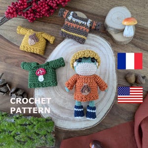 Puede incluir: Patrón de crochet para una linda rana que lleva un suéter marrón y un sombrero amarillo. El patrón incluye una variedad de otros artículos de crochet, incluyendo un suéter verde, un suéter amarillo y un suéter marrón con un patrón blanco y marrón. El patrón está disponible en inglés y francés.