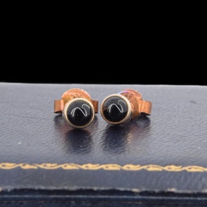 Vintage 8ct. gold earpins with onyx cabochons, made around 1990