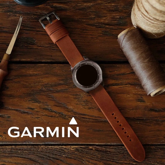 A custom hand-engraved leather watch strap for Garmin Fenix/smartwatch owners bridges analog craft and tech — 136 favorites proves this hits a real gap in the market.