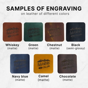 May include: Samples of leather engraving in different colors: whiskey, green, chestnut, black, navy blue, camel, and chocolate. The engraving says "Adventure is calling".