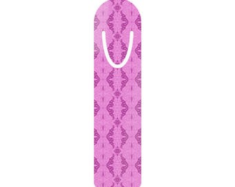 May include: A pink bookmark with a white curved top and a patterned design of butterflies. The bookmark is a vertical rectangle with a rounded top and a white curved insert for marking pages.