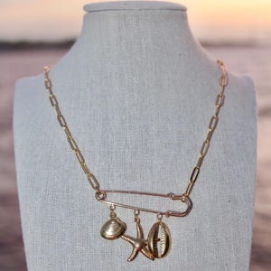 Collana con ciondolo in acciaio inossidabile e oro con mare