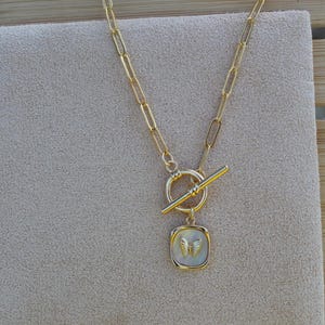 Collana con ciondolo a farfalla in acciaio inossidabile dorato
