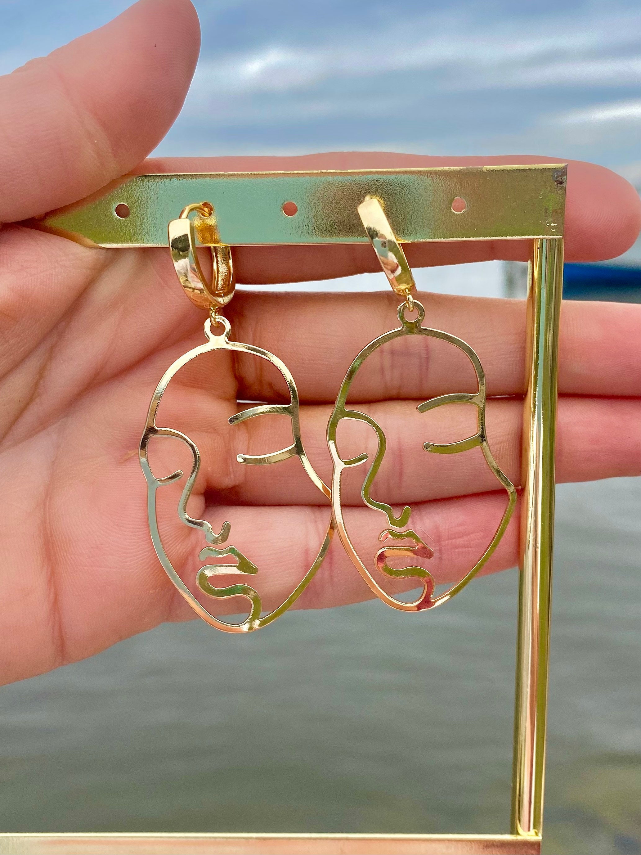 Gold wire face earrings best sale