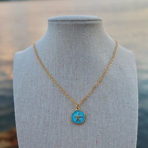 Collana in acciaio inossidabile con stella marina blu e oro