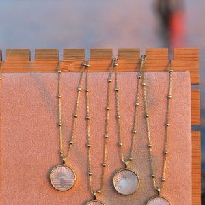 Collana in oro e perle tramonto/alba