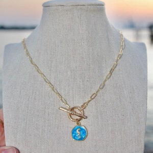 Collana con cavalluccio marino placcata in oro 14K