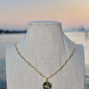 Collana con moneta stella marina d&#39;oro