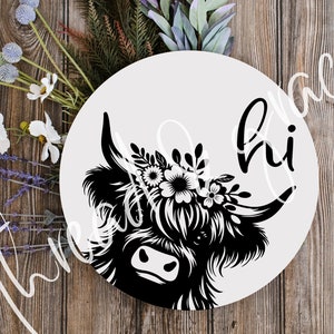 May include: Black and white silhouette of a Highland cow with a floral crown. The cow is looking to the right. The background is white. The text "Hi" is written in a cursive font on the right side of the image.