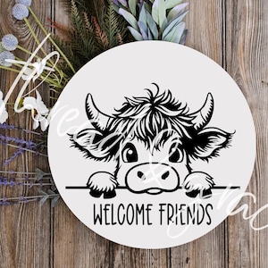 May include: Black and white illustration of a cow peeking over a sign that says "Welcome Friends".
