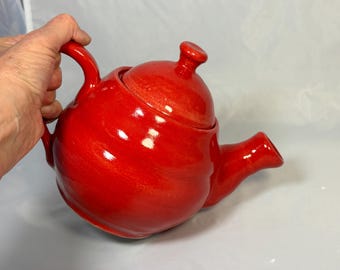 Tetera de color rojo brillante