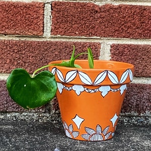 Classic clay plant pot,  brown terracotta  planter, handpainted with white-eyepopping abstract designs, indoor outdoor planter