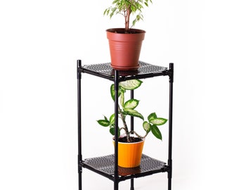 Black metal floor flower stand Stativer. Two-story shelf for plants.