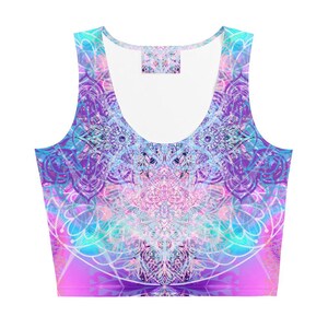 May include: A sleeveless crop top with a vibrant, intricate mandala design. The top features a blend of colors, including purple, pink, and turquoise, with a white inner lining. The design is symmetrical and detailed, creating a visually striking pattern.