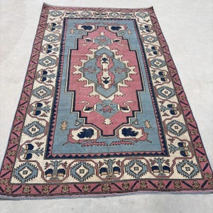 Vintage Turkish Area Rug, 6x9ft, Geometric and Floral Patterns, Pastel Blue and Pink Tones, Handmade Wool Carpet