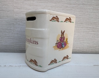Hucha de cerámica vintage con forma de libro de BunnyKins Royal Doulton, coleccionable.