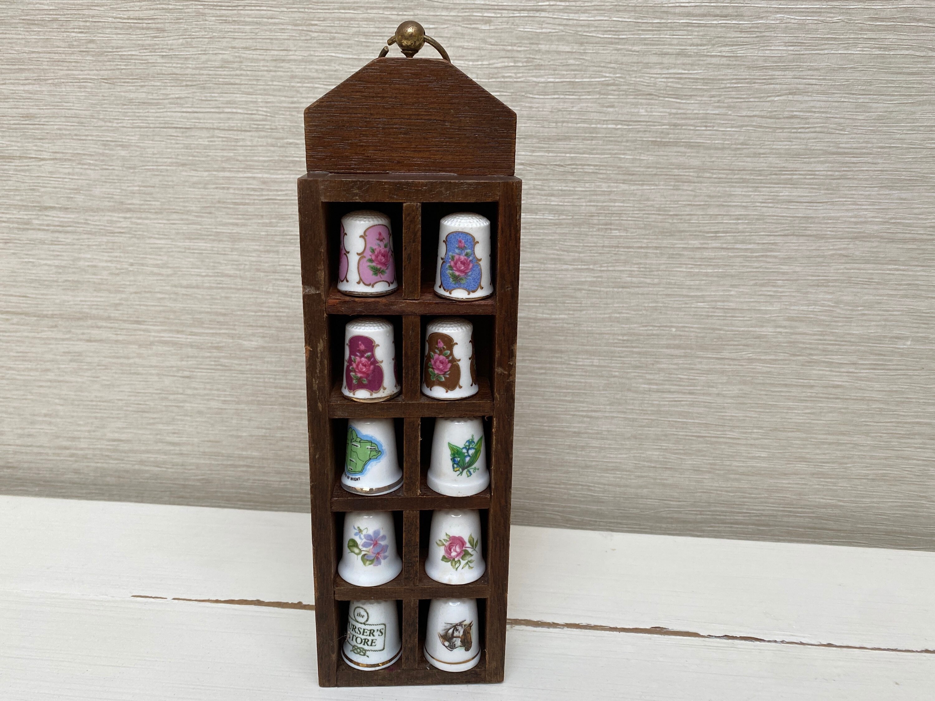 Thimble display case with 48 china thimbles solid case wooden