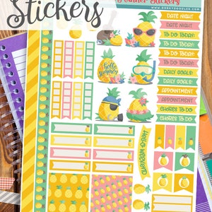 May include: Printable planner stickers featuring a pineapple theme. The stickers include various designs, such as pineapples with sunglasses, pineapples with flowers, and pineapples with a "hello summer" message. There are also blank boxes, banners, and labels for writing.