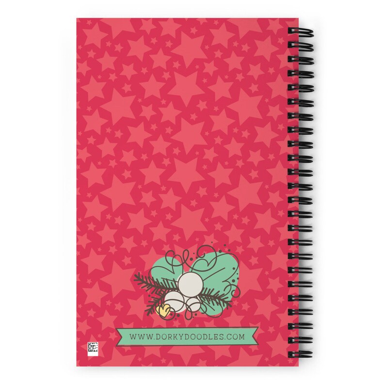 May include: A red spiral notebook with a white star pattern. The cover features a green and white illustration of a Christmas ornament with the text "www.dorkydoodles.com".