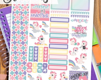 May include: A printable sheet of unicorn-themed stickers for planners. The sheet includes a variety of stickers, including unicorns, rainbows, hearts, stars, and text that says "Believe in unicorns", "magical", and "Even magical beings need their beauty sleep".