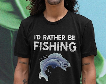 May include: A black t-shirt with a white graphic that says "I'd rather be fishing" and a blue fish illustration.