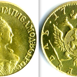 May include: Gold coin featuring a portrait of a woman on one side and a double-headed eagle with a crown on the other. The inscription on the coin reads "IMPERATRIX  ALLISSIMAE  RUSSIAE  1765".