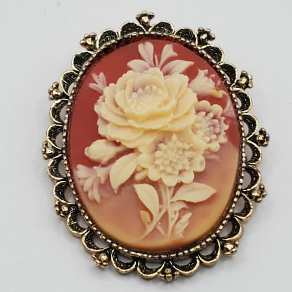 Flower cameo brooch best sale