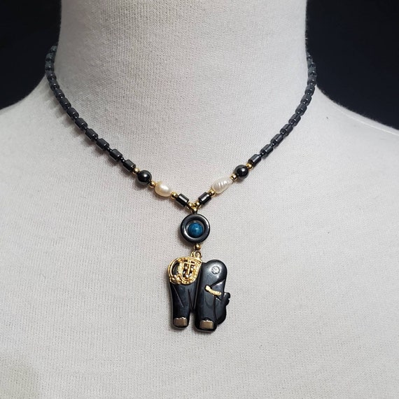 Hematite elephant best sale necklace