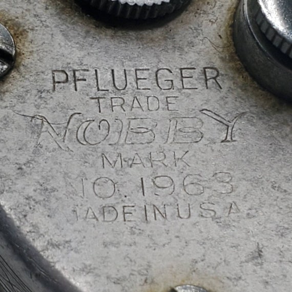 VINTAGE PFLUEGER NOBBY No. 1963 Chrome Fishing Reel Yellow Handles